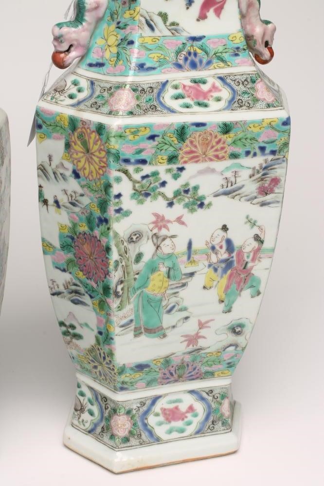 A PAIR OF CHINESE PORCELAIN VASES of inverted baluster hexagonal form with chi-long handles painted Image