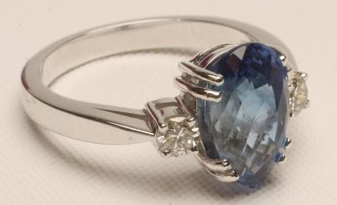 A THREE STONE SAPPHIRE AND DIAMOND RING Image
