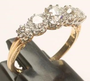 A FIVE STONE STONE DIAMOND RING Image