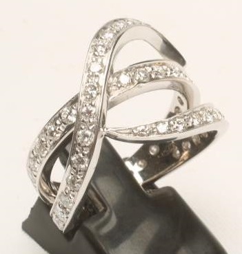 A MODERN DIAMOND ETERNITY RING Image