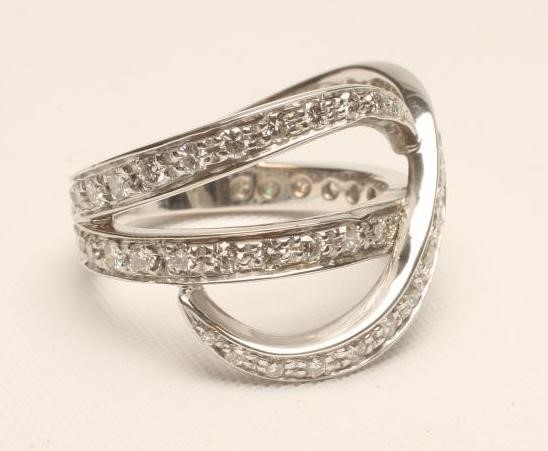 A MODERN DIAMOND ETERNITY RING Image