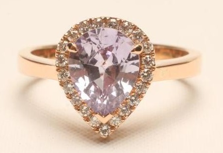 A PINK SAPPHIRE AND DIAMOND CLUSTER RING Image
