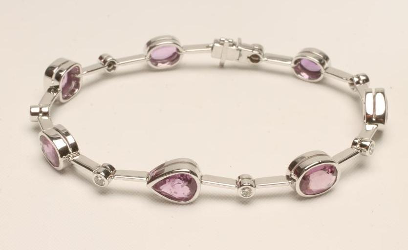 A PINK SAPPHIRE AND DIAMOND BRACELET Image