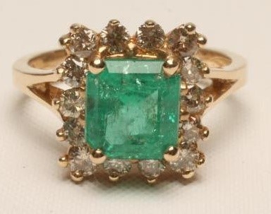 AN EMERALD AND DIAMOND SQUARE CLUSTER RING Image