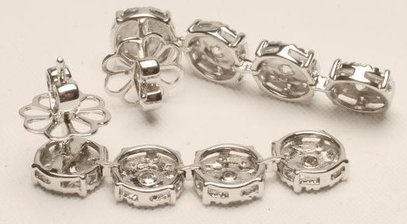 A PAIR OF DIAMOND CLUSTER DROP EAR STUDS Image