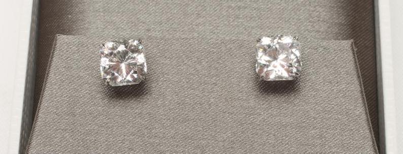 A PAIR OF "CARAT LONDON" BOUTIQUE EAR STUDS Image