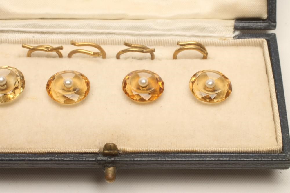 A COMPOSITE SET OF FOUR DRESS STUDS Image