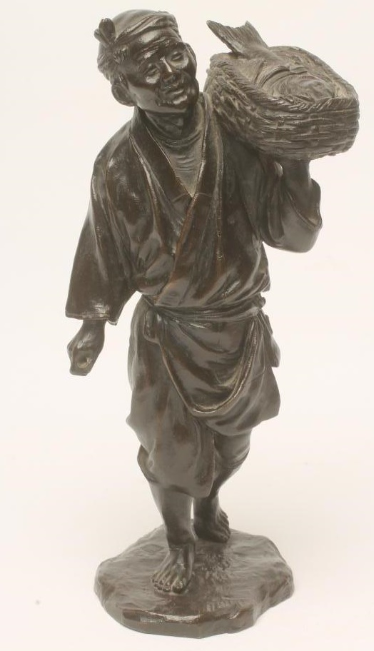 A JAPANESE BRONZE FIGURE Image