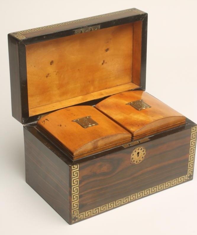 A REGENCY COROMANDEL TEA CADDY of plain oblong form Image