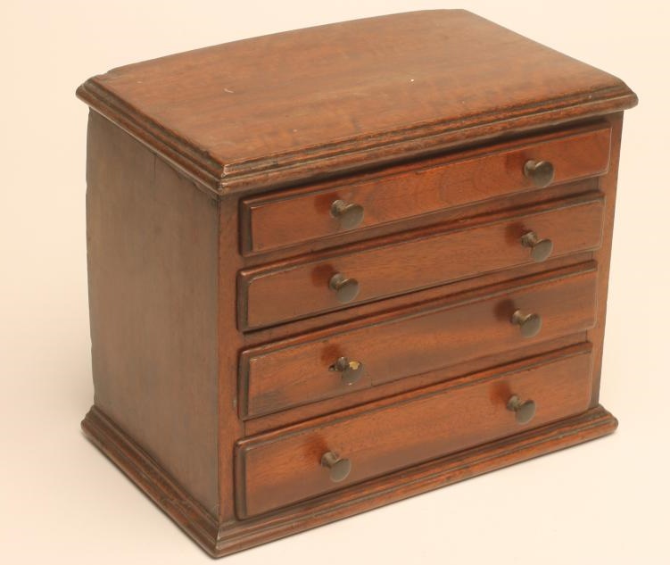 A VICTORIAN MAHOGANY MINIATURE CHEST Image