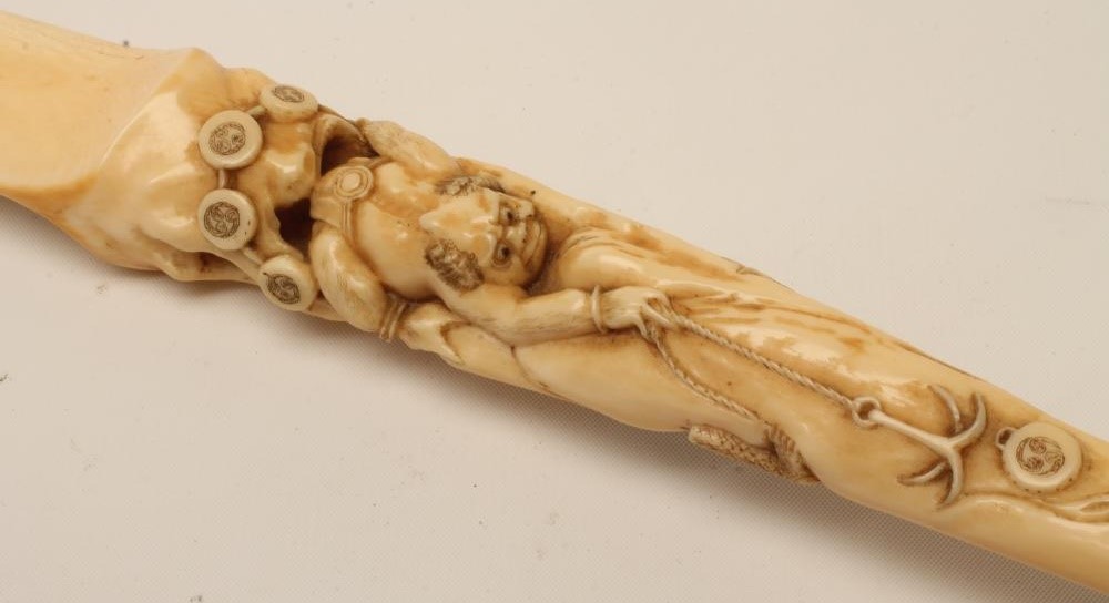 A JAPANESE IVORY PAGE TURNER Image