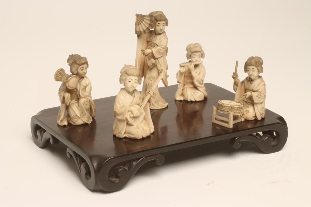 A COLLECTION OF JAPANESE IVORY FEMALE MUSICIANS AND FAN DANCER Image