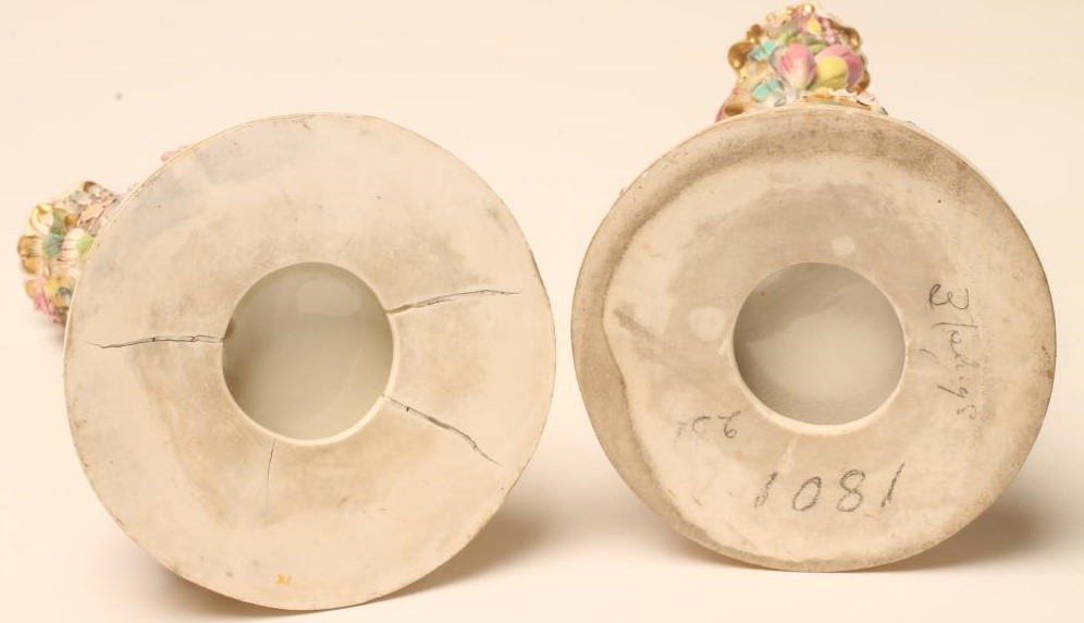 A PAIR OF MINTON PORCELAIN FIGURAL CANDLESTICKS Image