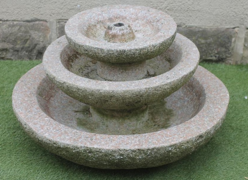 A PINK GRANITE FOUNTAIN Image