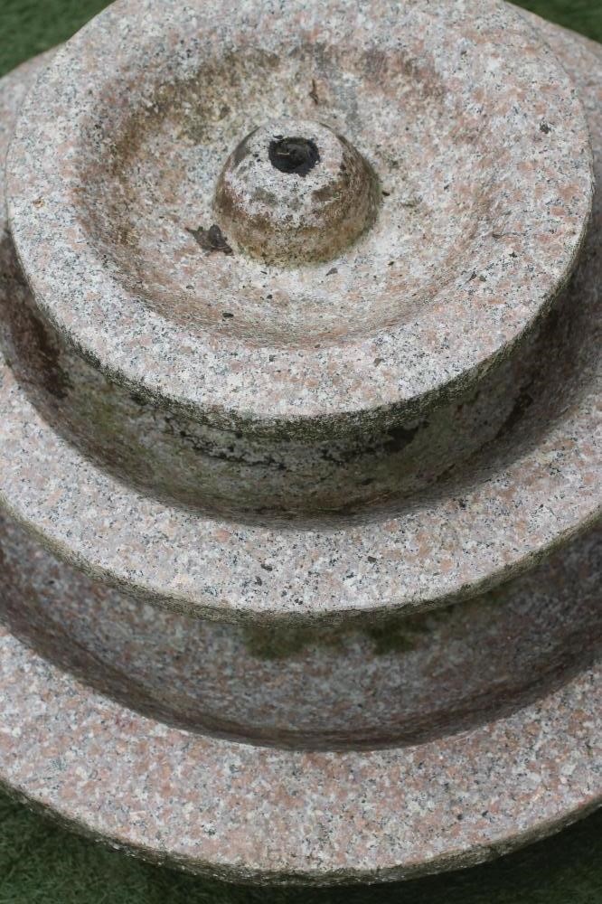A PINK GRANITE FOUNTAIN Image