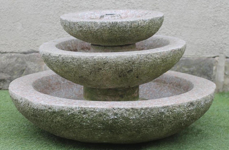 A PINK GRANITE FOUNTAIN Image