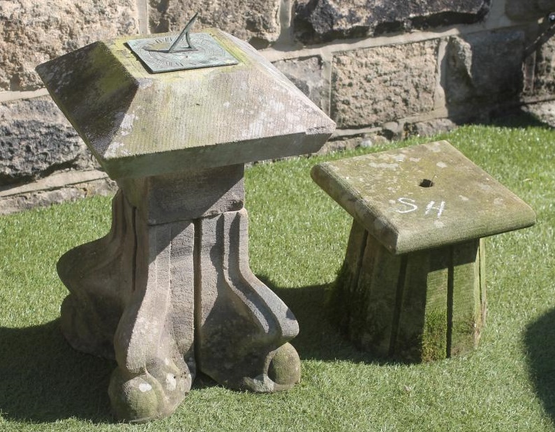 A SANDSTONE SUNDIAL of domed square form with copper dial Image