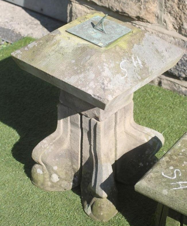 A SANDSTONE SUNDIAL of domed square form with copper dial Image