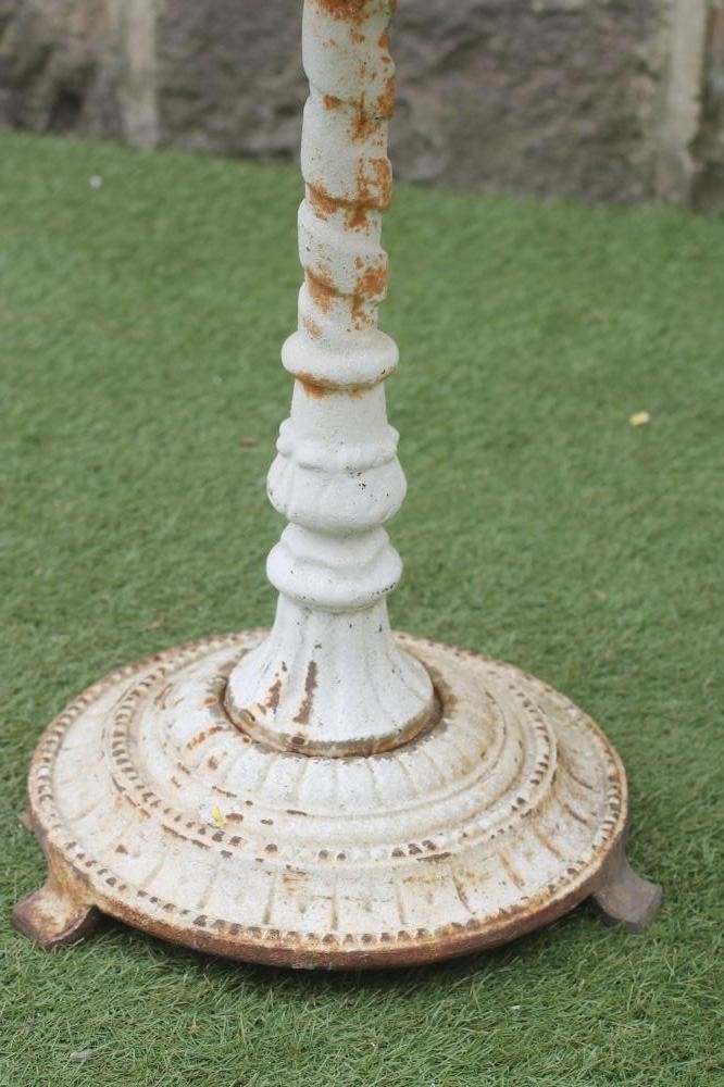 A VICTORIAN CAST IRON TABLE Image