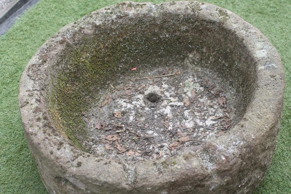 A SANDSTONE TROUGH of deep circular form Image