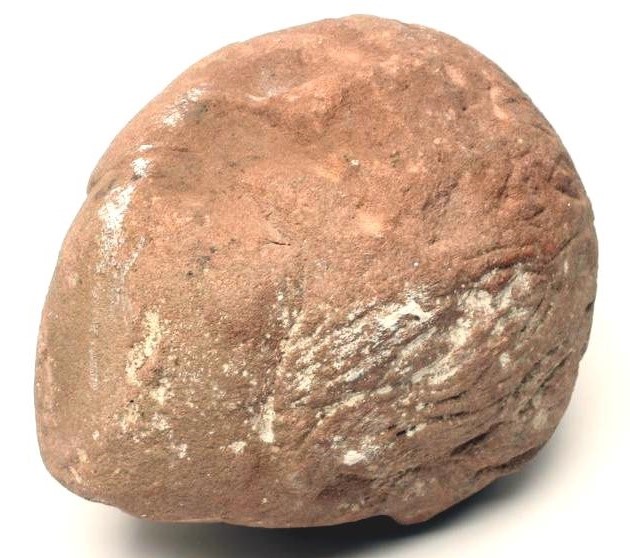 A CARVED RED SANDSTONE HEAD OF A YOUNG MAN Image