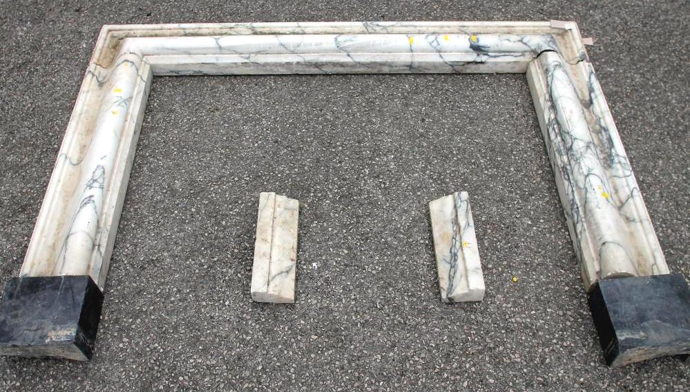 A VEINED WHITE MARBLE FIRE SURROUND Image