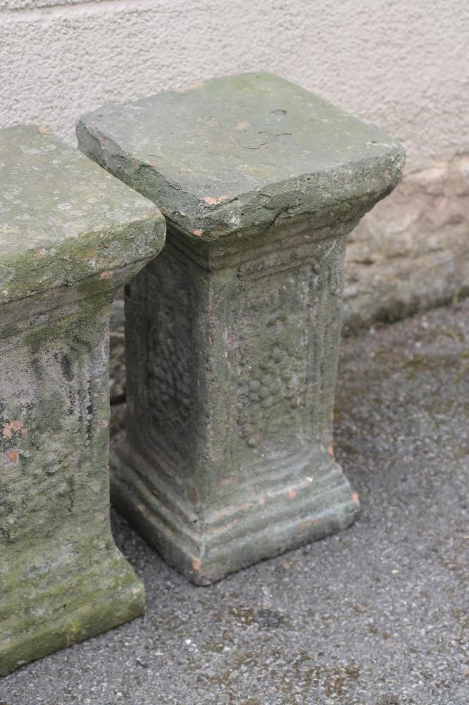 A VICTORIAN TERRACOTTA URN of ovoid form with floral swags suspended from lug handles Image