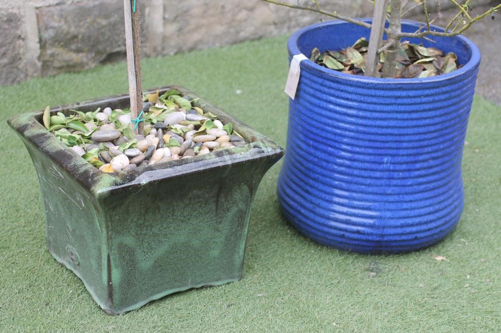 A BLUE GLAZED POTTERY FLOWER POT Image