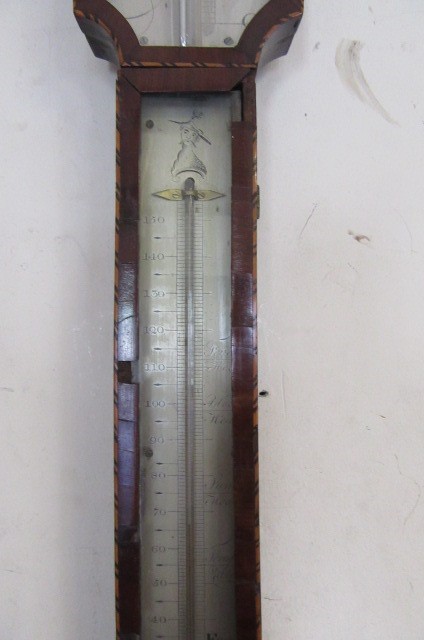 A MAHOGANY STICK BAROMETER BY RABALIO Image
