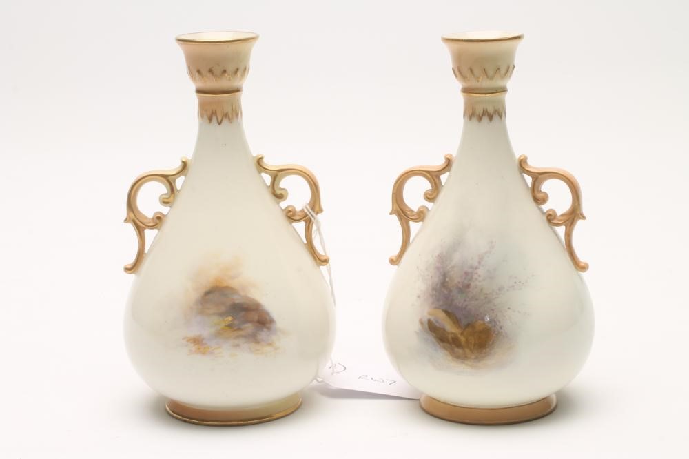 A PAIR OF ROYAL WORCESTER CHINA VASES Image