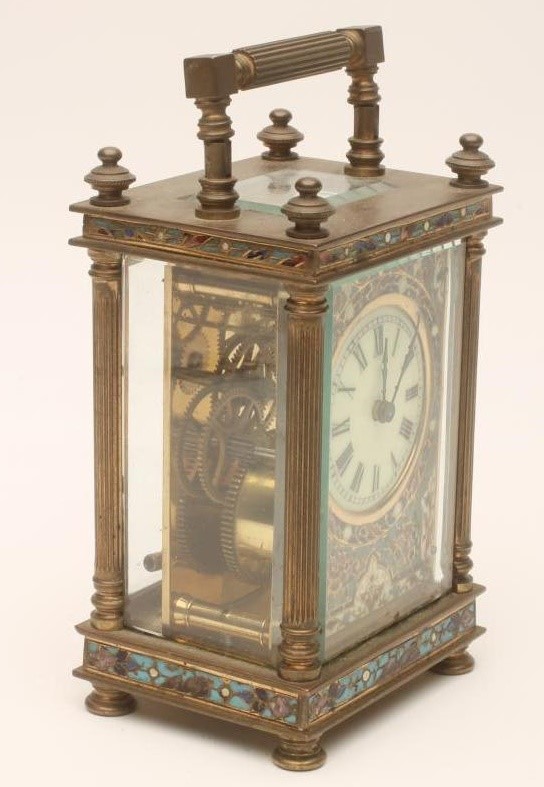 A BRASS AND CHAMPLEVE ENAMEL CASED CARRIAGE CLOCK Image