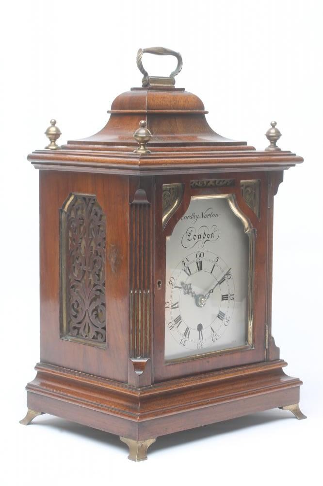 A MAHOGANY CASED TABLE CLOCK by Eardley Norton Image