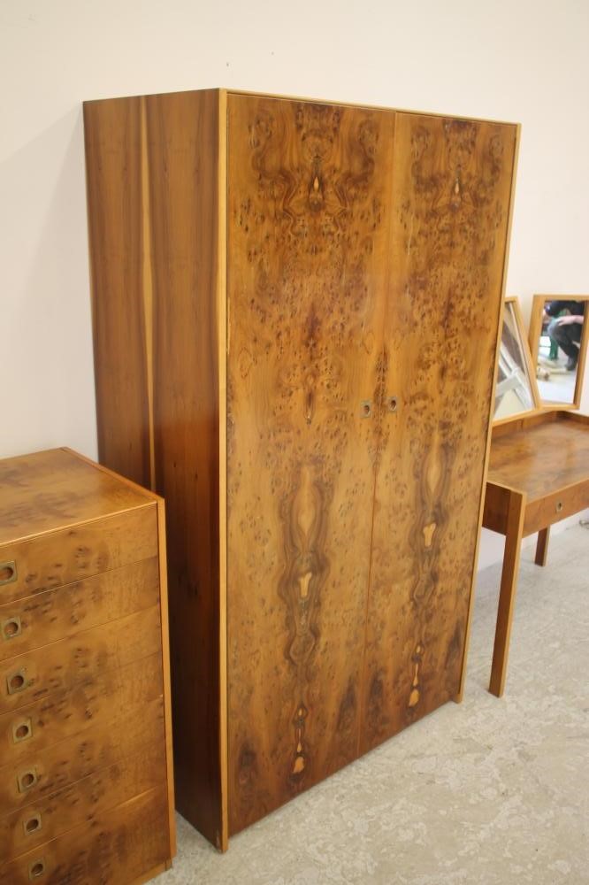 A HEALS OF LONDON THREE PIECE YEW VENEERED AND TEAK (?) BEDROOM SUITE Image