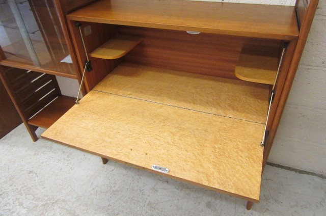 A STAPLES TEAK LADDERAX ROOM UNIT comprising three wooden ladders Image