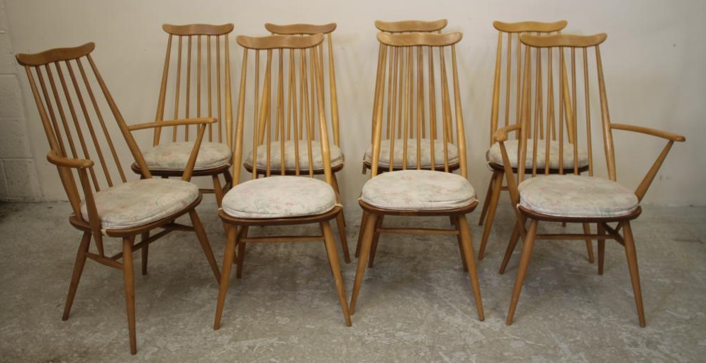 A SET OF EIGHT ERCOL ELM DINING CHAIRS in Goldsmith pattern Image