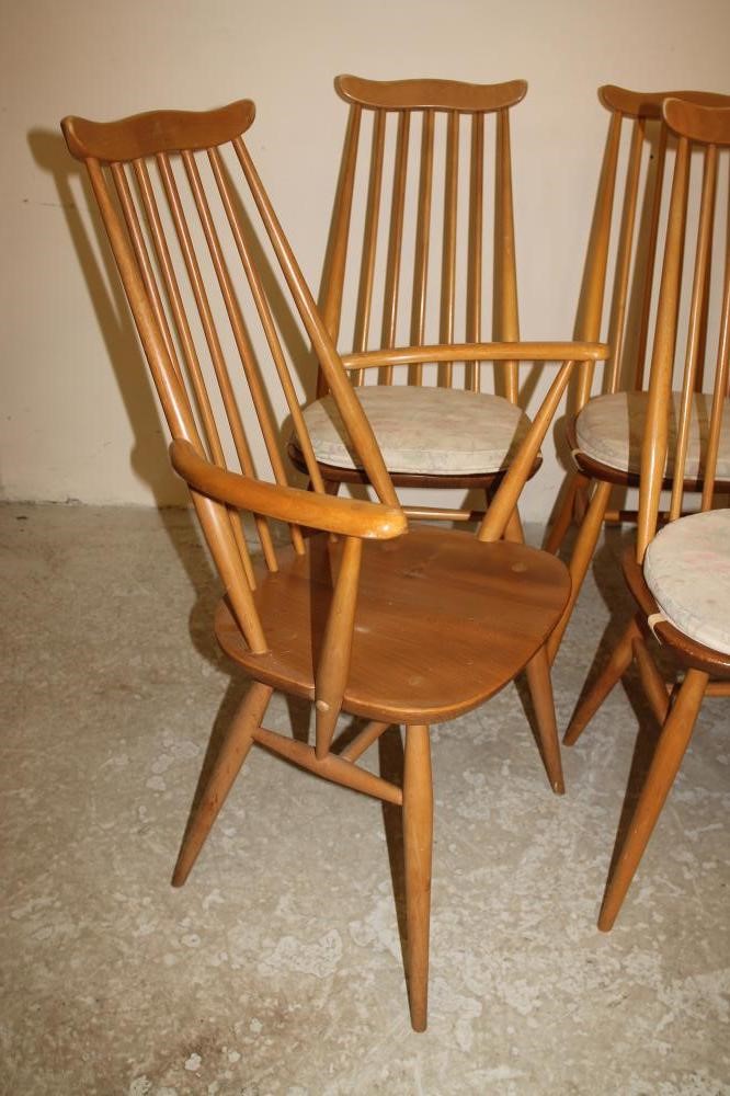 A SET OF EIGHT ERCOL ELM DINING CHAIRS in Goldsmith pattern Image