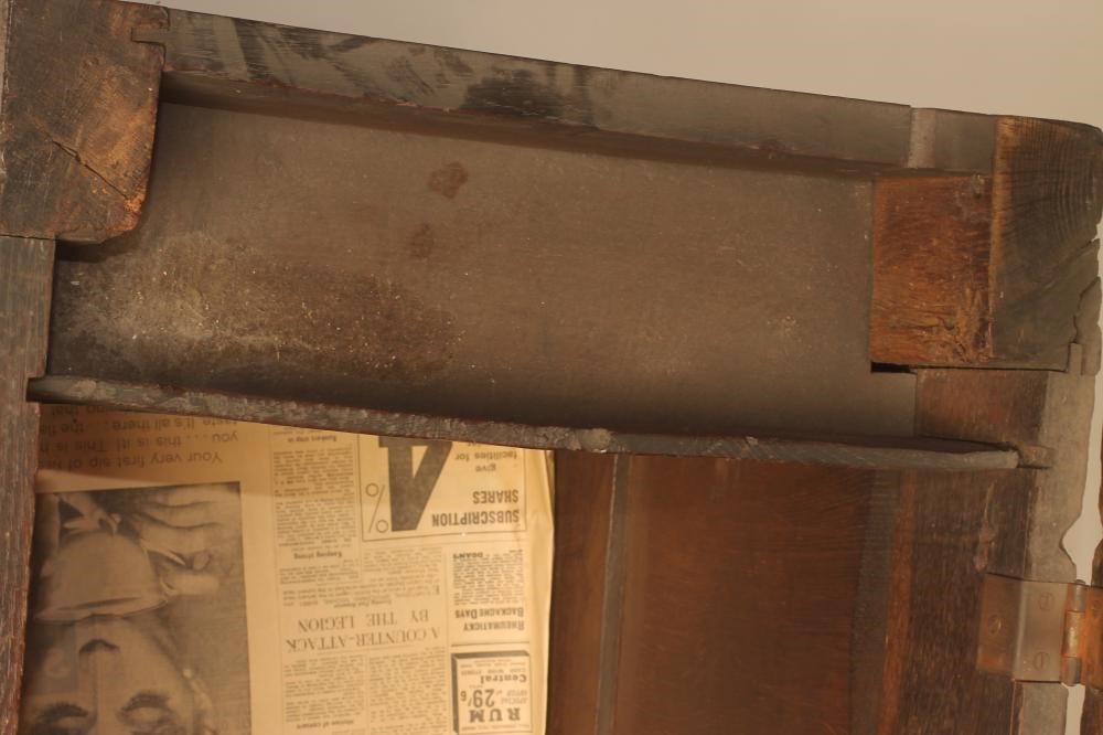 AN OAK PANELLED COFFER Image