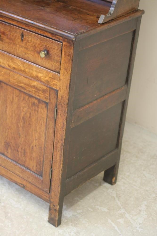 AN OAK ENCLOSED DRESSER Image