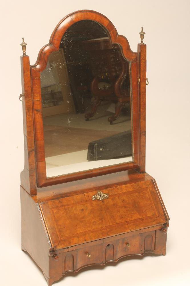 AN EARLY GEORGIAN AND LATER WALNUT TOILET MIRROR Image