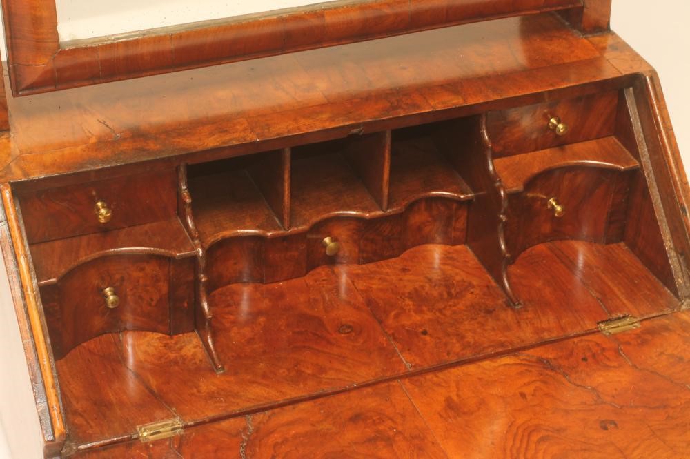 AN EARLY GEORGIAN AND LATER WALNUT TOILET MIRROR Image