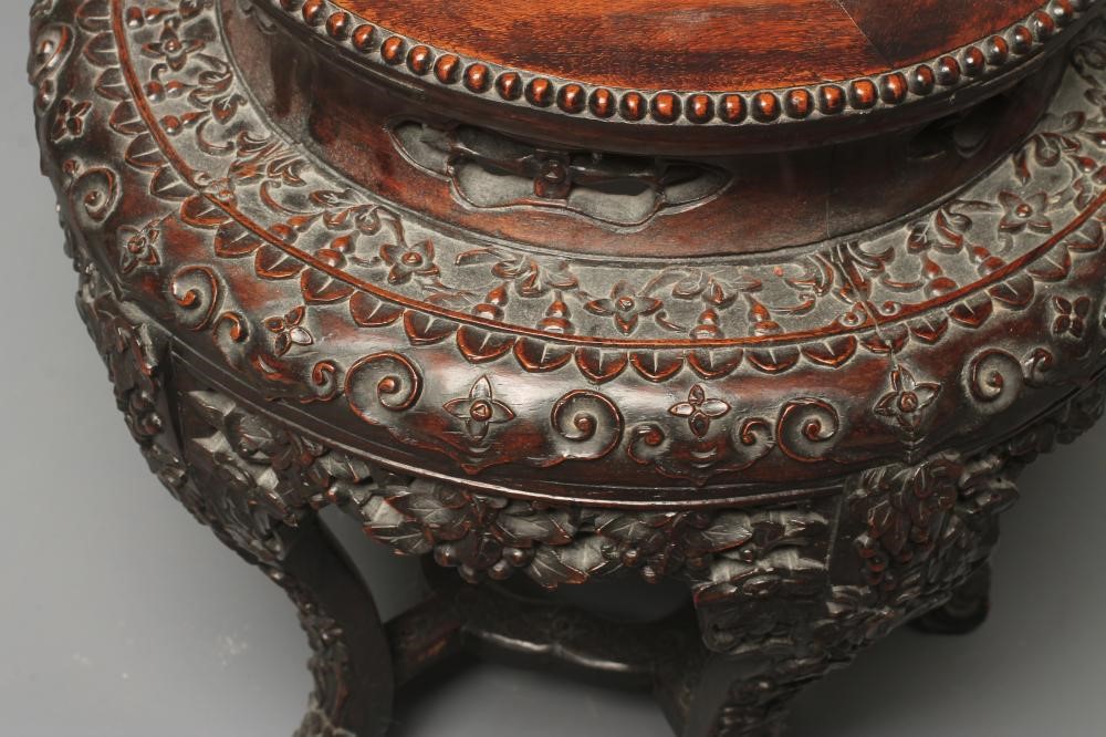 A CHINESE PADOUK WOOD JARDINIERE STAND Image