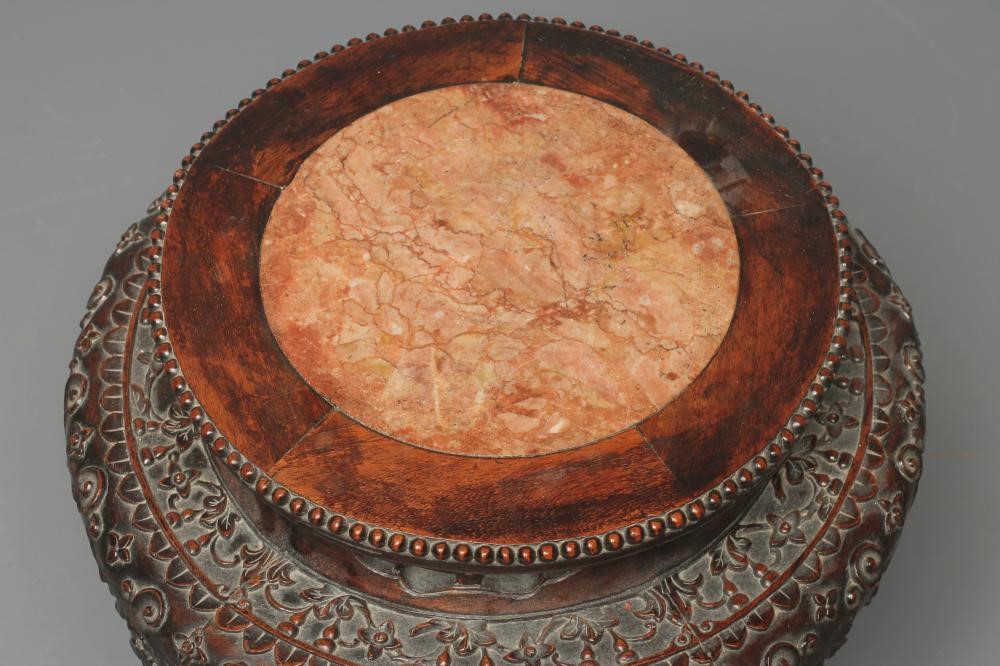 A CHINESE PADOUK WOOD JARDINIERE STAND Image