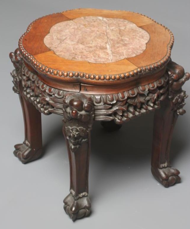 A CHINESE CARVED PADOUK WOOD JARDINIERE STAND Image