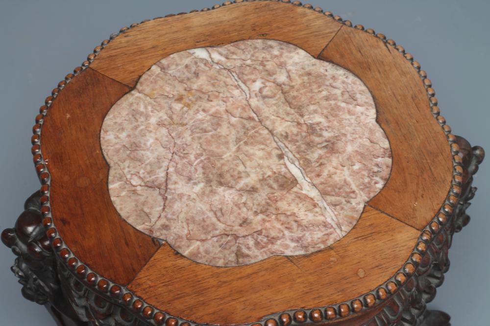 A CHINESE CARVED PADOUK WOOD JARDINIERE STAND Image