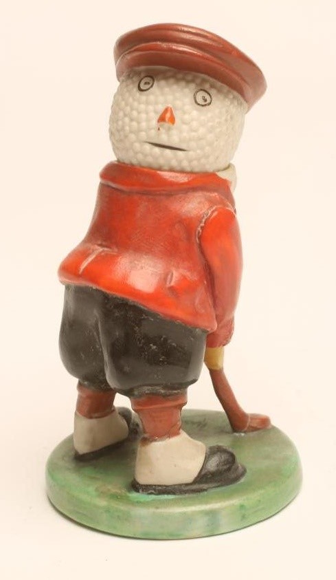 A WILTSHAW & ROBINSON CARLTON CHINA GOLFING FIGURE Image