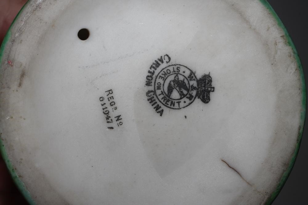 A WILTSHAW & ROBINSON CARLTON CHINA GOLFING FIGURE Image