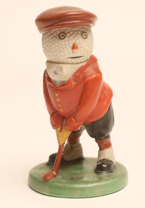 A WILTSHAW & ROBINSON CARLTON CHINA GOLFING FIGURE Image