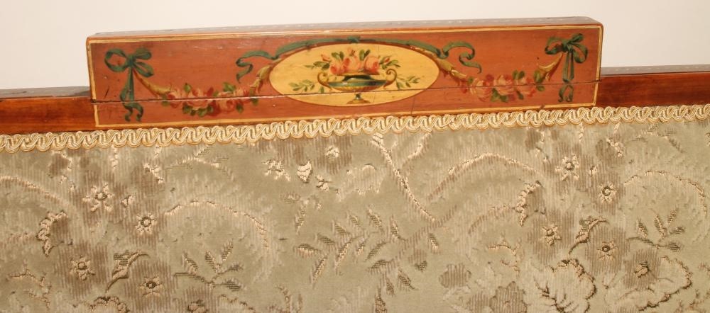 AN EDWARDIAN PAINTED SATINWOOD SETTEE upholstered in cut velvet and painted with ribbons Image
