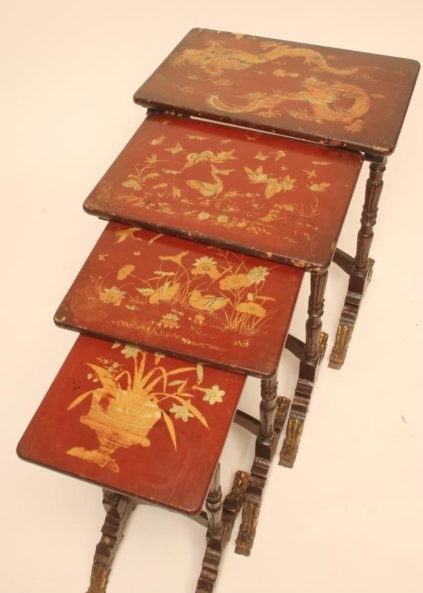 A CHINESE QUARTETTO NEST OF RED LACQUERED TABLES Image