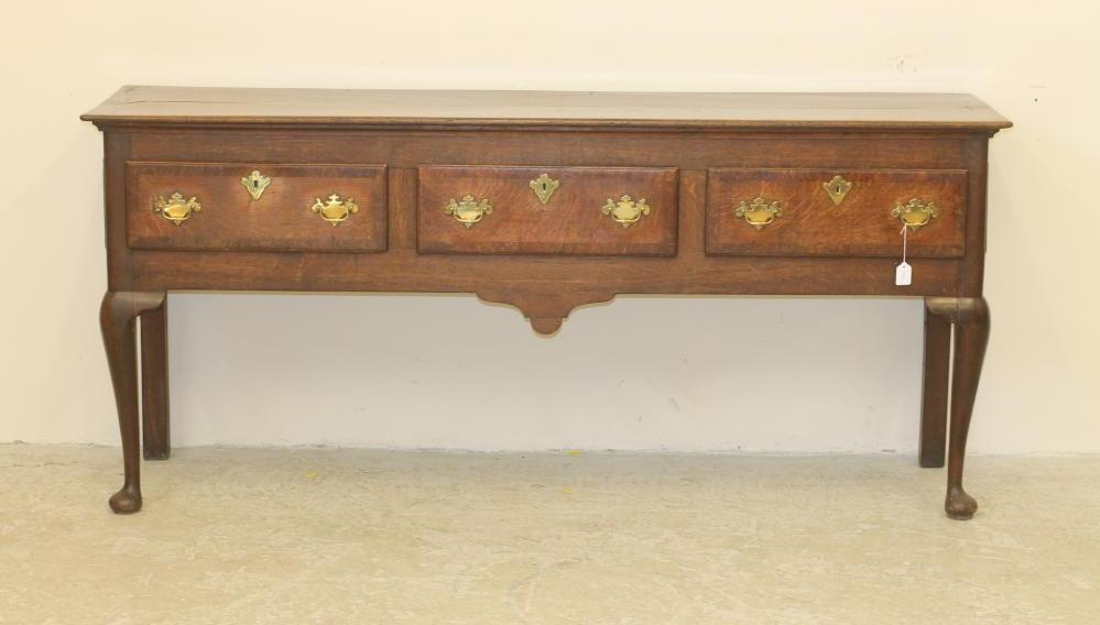 A GEORGIAN OAK AND MAHOGANY BANDED LOW DRESSER Image